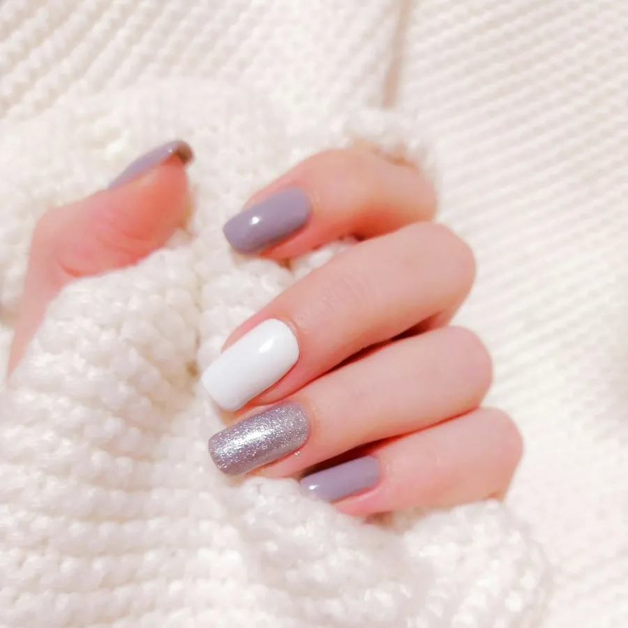 A manicure in progress at a calm, modern nail station.